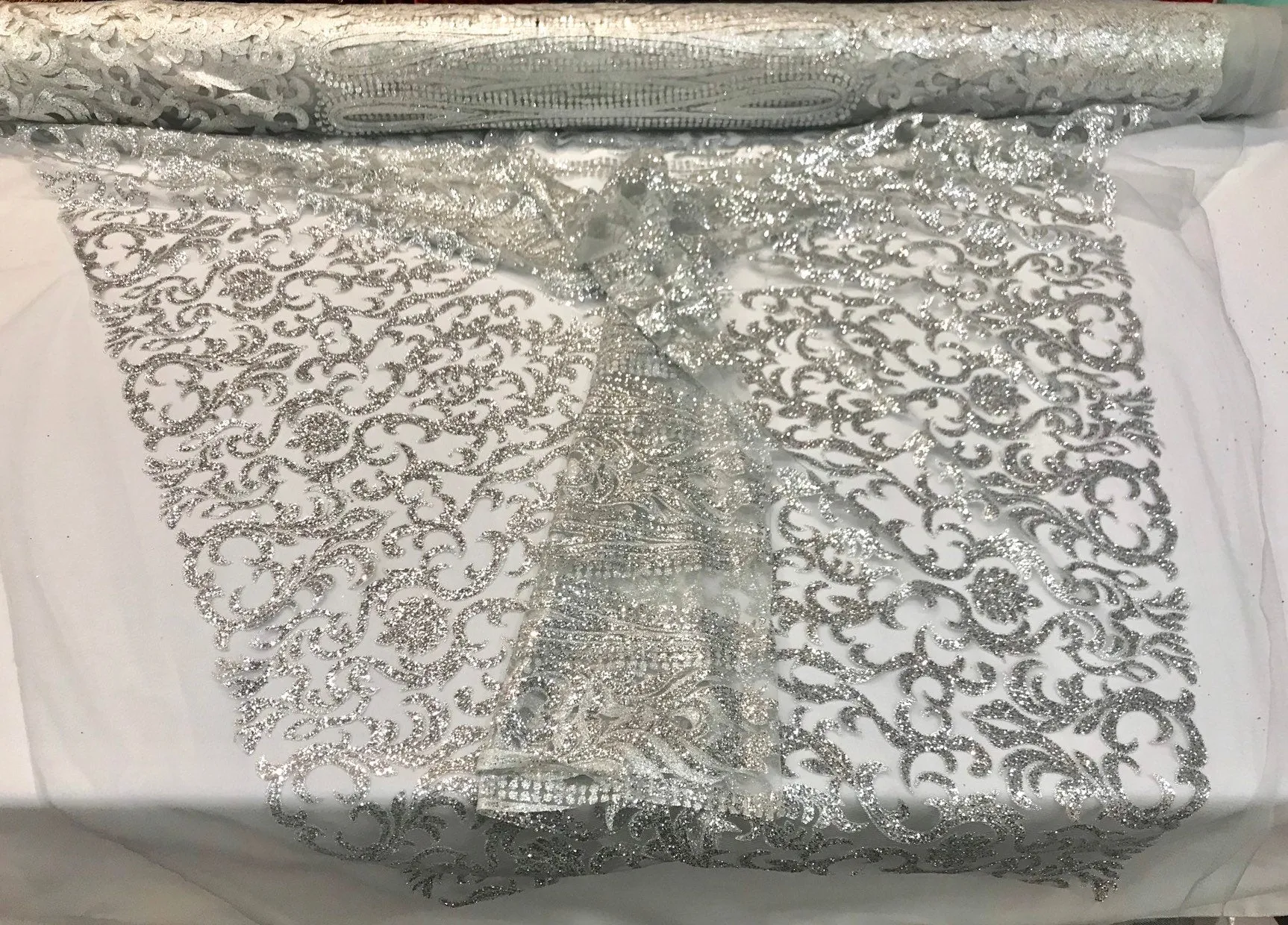 Silver shiny glitter damask design on a mesh lace-dresses-fashion-apparel-prom-nightgown-decorations-sold by the yard.